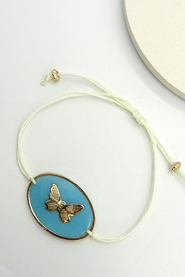 BUTTERFLY, ADJUSTABLE THREAD BRACELET | 31B9000