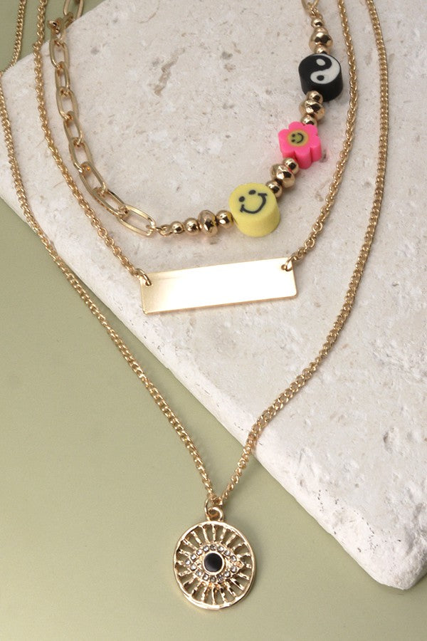 TRIO LAYER EYE AND RUBBER CHARM NECKLACE | 31N21243