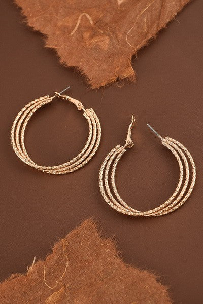 DIAMOND CUT TRIPLE INTERWINED HOOP EARRINGS | 31E21734