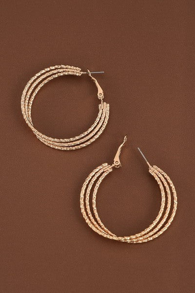 DIAMOND CUT TRIPLE INTERWINED HOOP EARRINGS | 31E21734