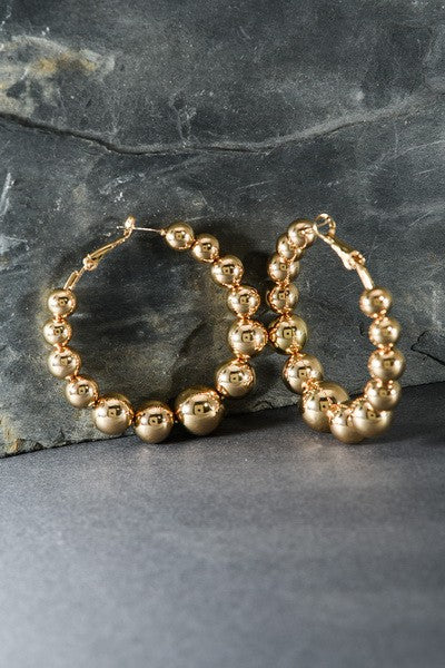 GRADUATED BALL HOOP EARRINGS | 31E22903