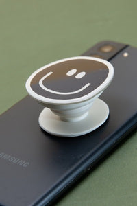 BLACK AND WHITE SMILEY PHONE GRIP HOLDER  | 40PH4022