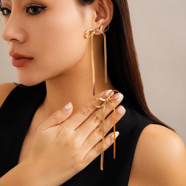 HERRINGBONE SNAKE CHAIN LONG BOW EARRINGS | 40E294