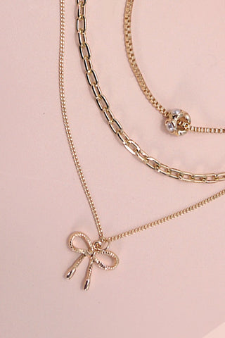 MULTI LAYER PEARL BOW CAHRM NECKLACE | 80N605