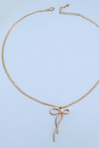 PEARL EMBELLISHED BOW PENDANT NECKLACE | 31N24080