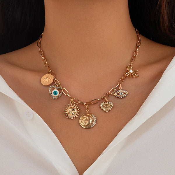 CHARM NECKLACE-SUN EVIL EYE HEART HAMMERED DISC | 40NK365