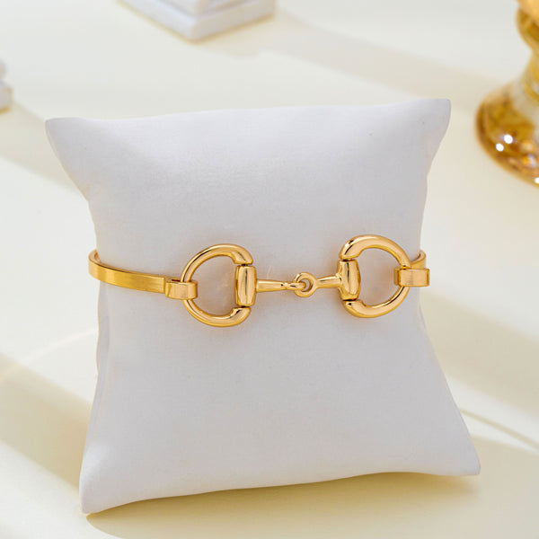 Horsebit Centerpiece Gold-Tone Bangle Bracelet | 80B1951