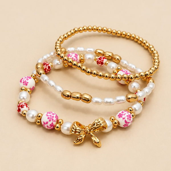 PINK CERAMIC PORCELAIN BOW MULTI LAYER BRACELET | 80B1340
