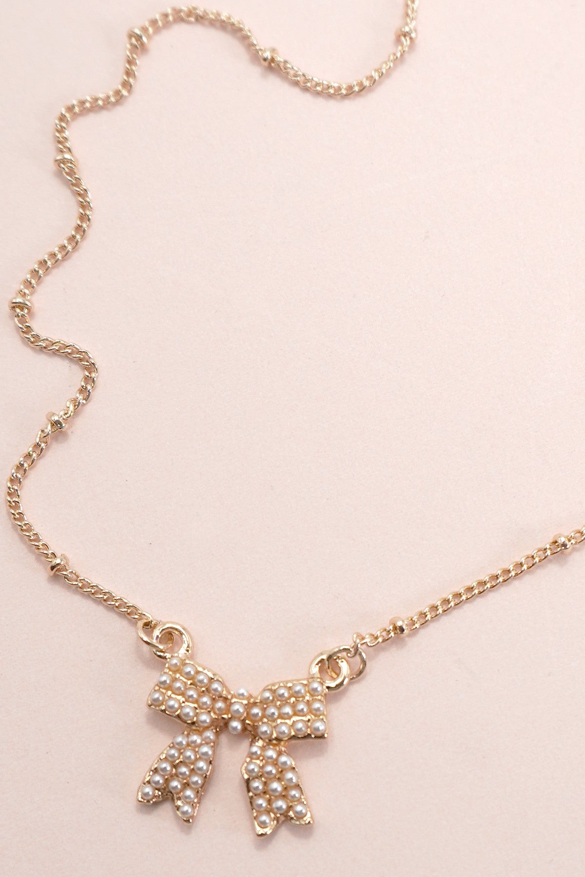 PEARL BOW CHARM BALL CHAIN NECKLACE | 80N91620