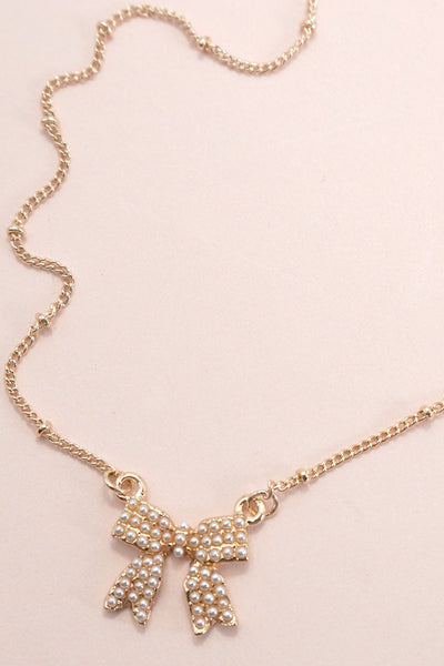 PEARL BOW CHARM BALL CHAIN NECKLACE | 80N91620