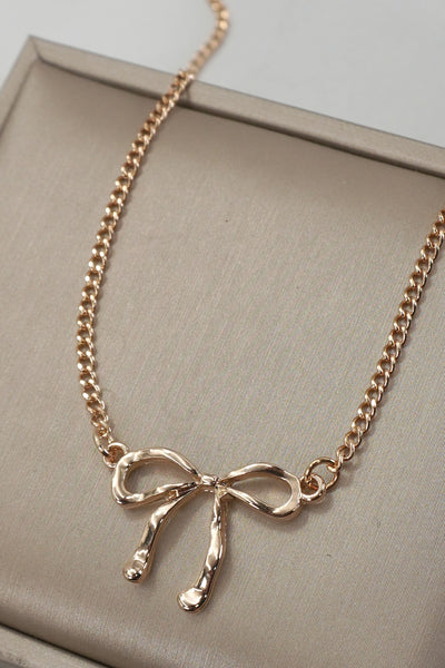 CLASSIC HAMMERED BOW NECKLACE | 31N50532