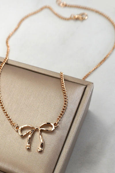 CLASSIC HAMMERED BOW NECKLACE | 31N50532