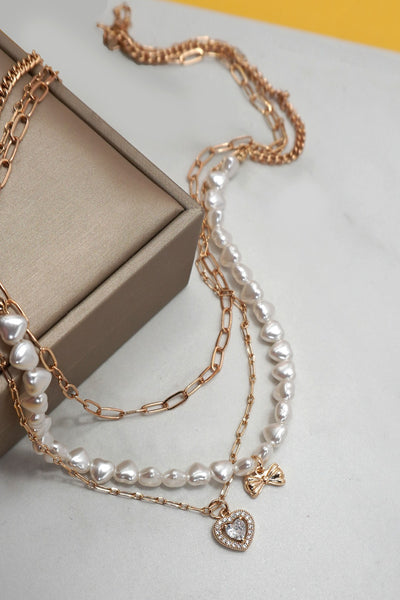 MULTI PEARL LAYER SET BOW HEART PENDANT NECKLACE | 25N942
