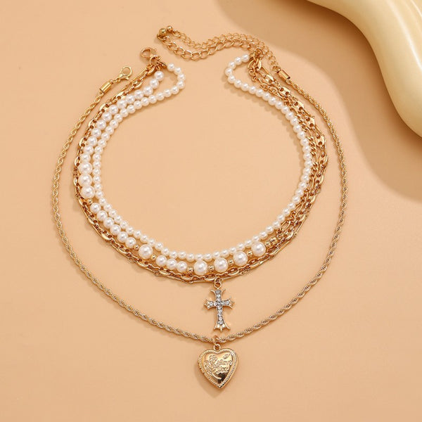 CROSS HEART CHARM MULTILAYER PEARL NECKLACE | 40NK9457