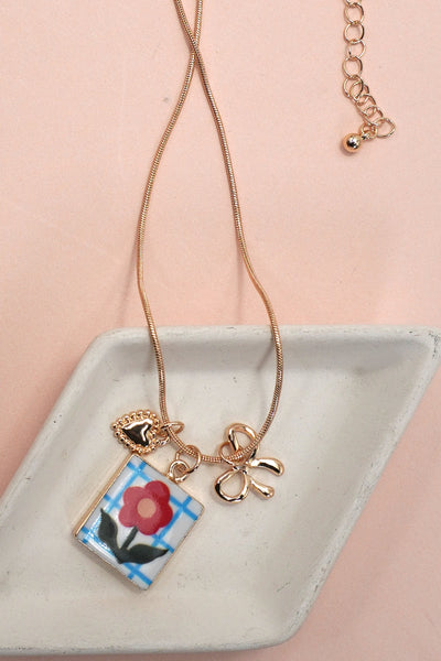 PORCELAIN CLUSTER CHARM BOW HEART NECKLACE | 80N91840