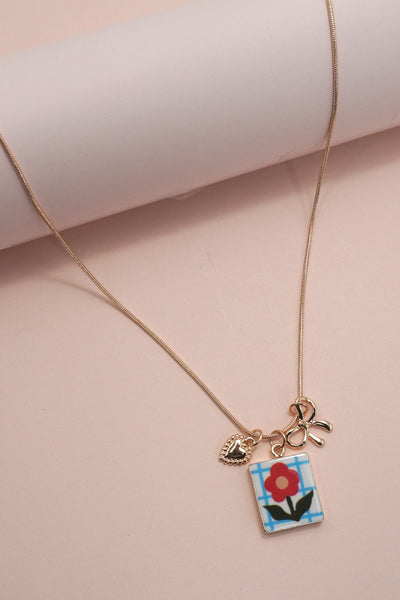 PORCELAIN CLUSTER CHARM BOW HEART NECKLACE | 80N91840
