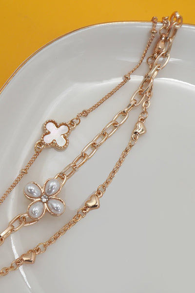 CHARM BRACELET-MULTILAYER FLORAL PEARL CROSS | 80B1352