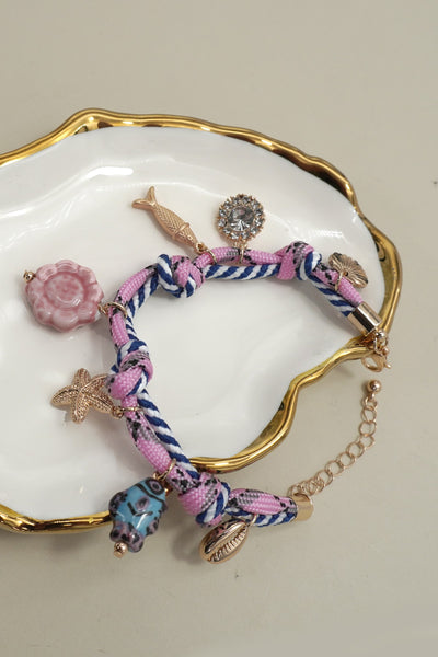 CORDED CHARM-FISH PORCELAIN RHINESTONE BRACELET | 80B1503