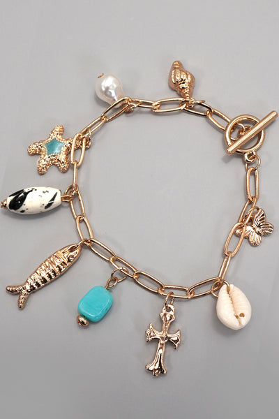 CHARM TOGGLE BRACELET-FISH CROSS CONCH PEARL | 80B1514