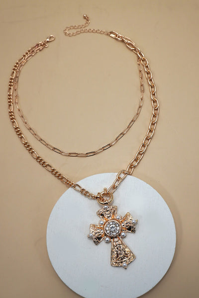 MULTI LAYERED CROSS STATEMENT NECKLACE | 80N92465