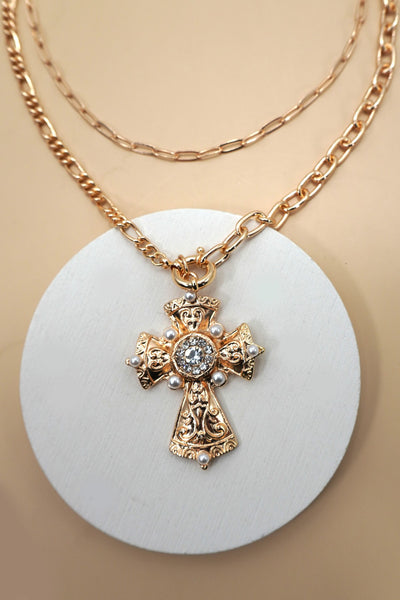 MULTI LAYERED CROSS STATEMENT NECKLACE | 80N92465