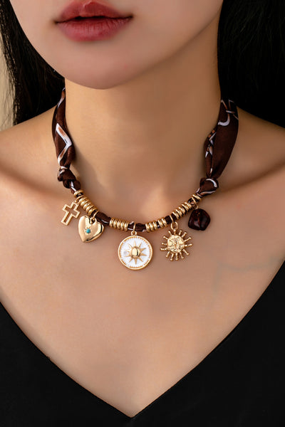 CHARM NECKLACE-SUN HEART CROSS TORT | 80N92528