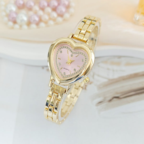 HEART DIAL OVAL BAND BRACELET WATCH | 40W3000
