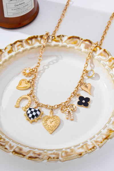 Checkered Heart Pearl Bow Multi-Charm Link Necklace | 80N93113