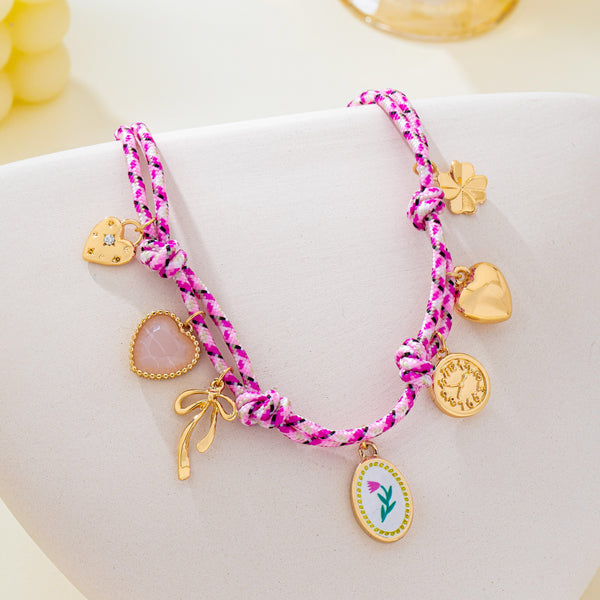 Corded Multi Charm Bow Heart Floral Necklace | 80N93440