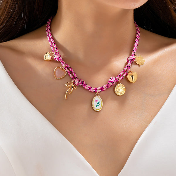 Corded Multi Charm Bow Heart Floral Necklace | 80N93440