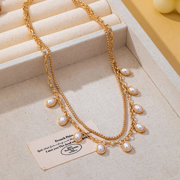 Layered Gold Chain Pearl Charm Necklace | 80N93660