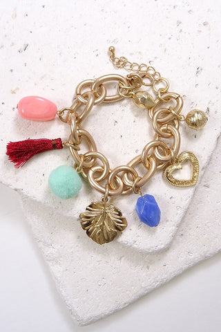 Chunky chain bracelet with assortment of charms  | 510462101
