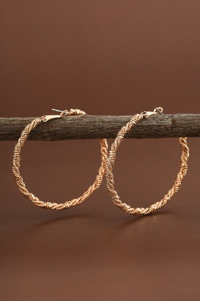 TWISTED WIRED HOOP EARRINGS 31E190068