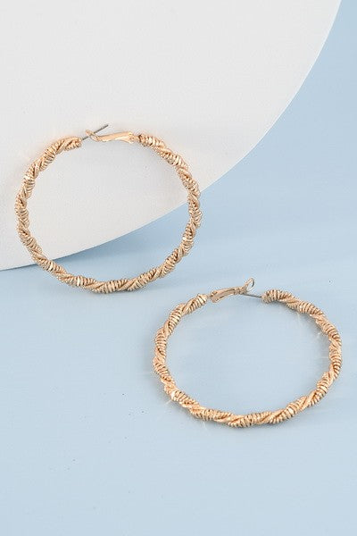 TWISTED WIRED HOOP EARRINGS 31E190068